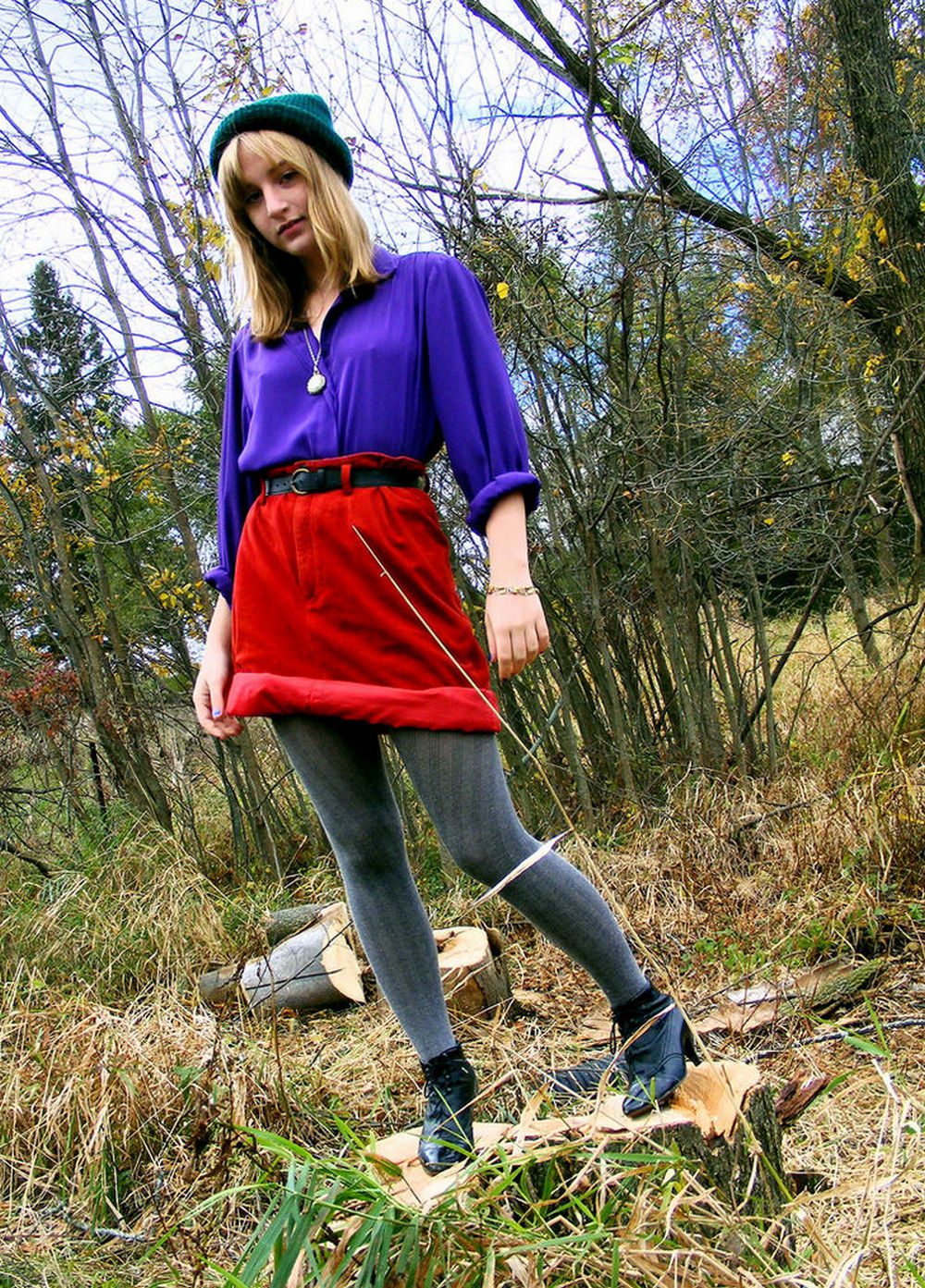 Grey tights with red skirt and purple blouse