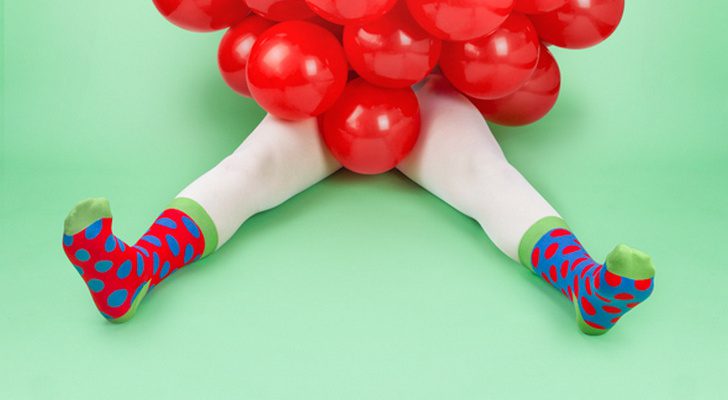White tights and multicolored socks in an Odd Pears Campaign