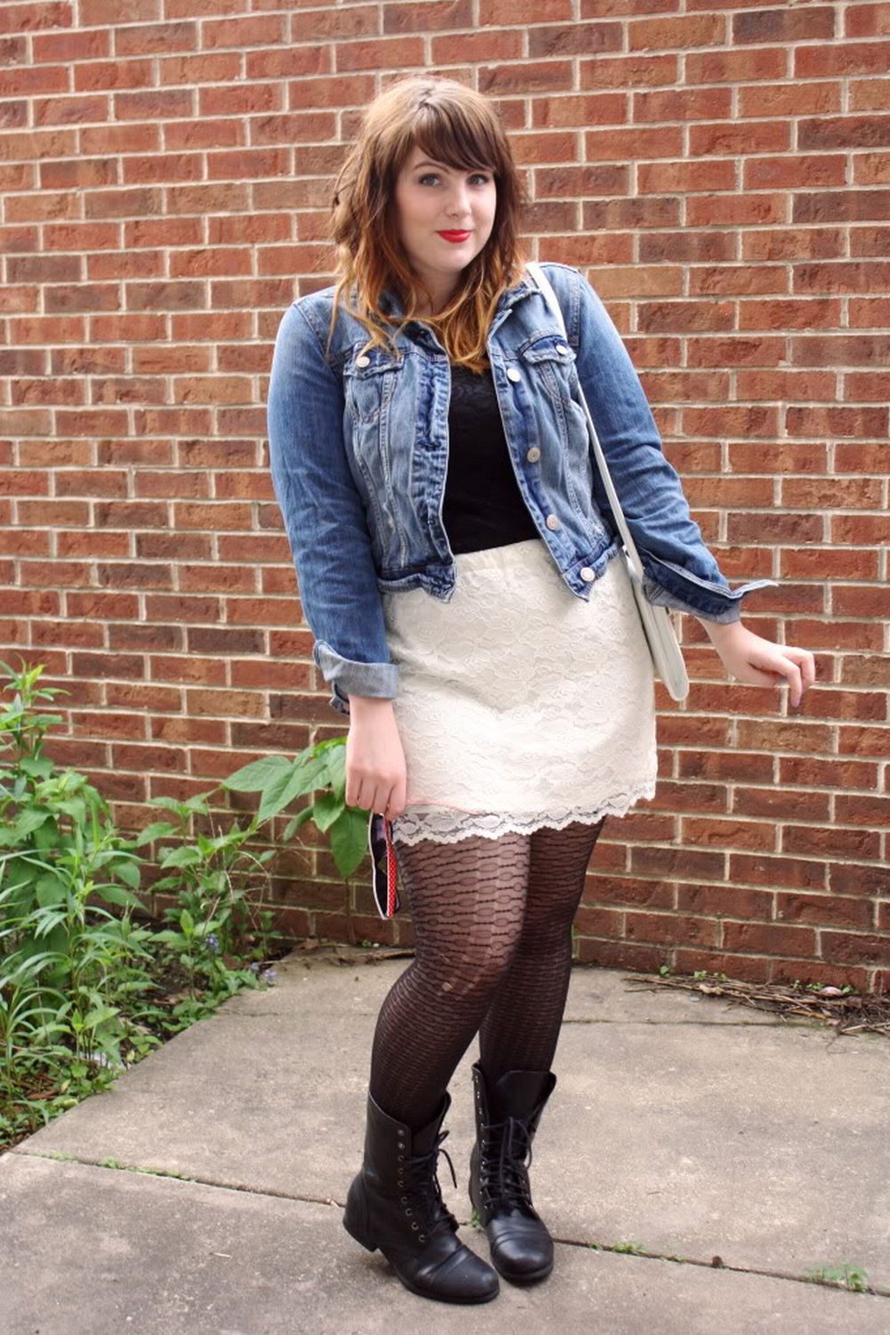 Snakeskin pattern lace tights with denim jacket and combat boots
