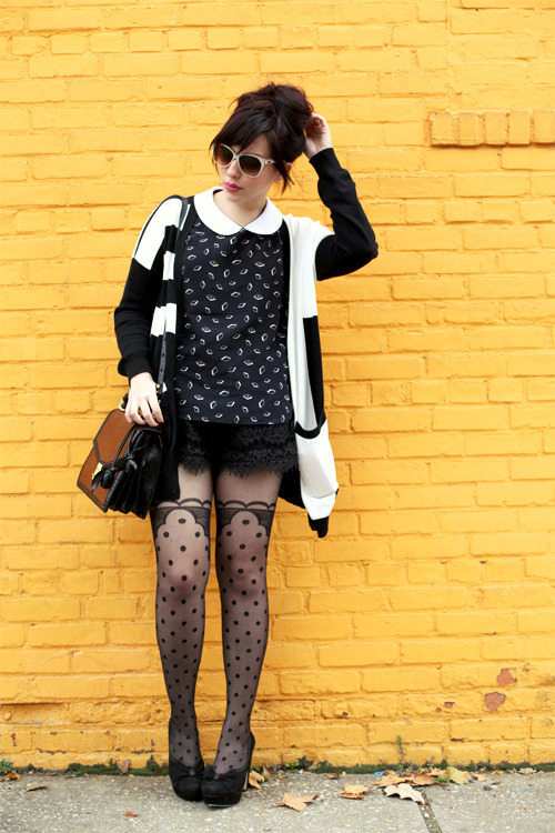 Polka dot faux thigh-high tights with a scalloped top band, lace shorts and a black-and-white cardigan
