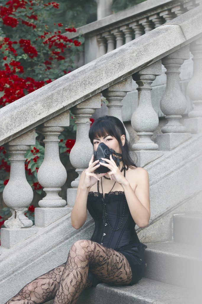 Black lace gothic pantyhose and dress worn by Isis Tomie