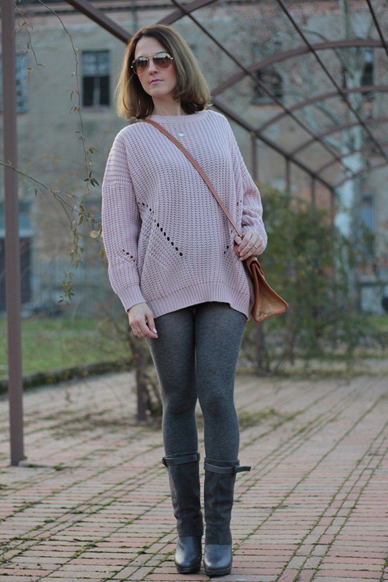 Grey wool leggings, long black boots and oversized pink sweater worn by Margaret