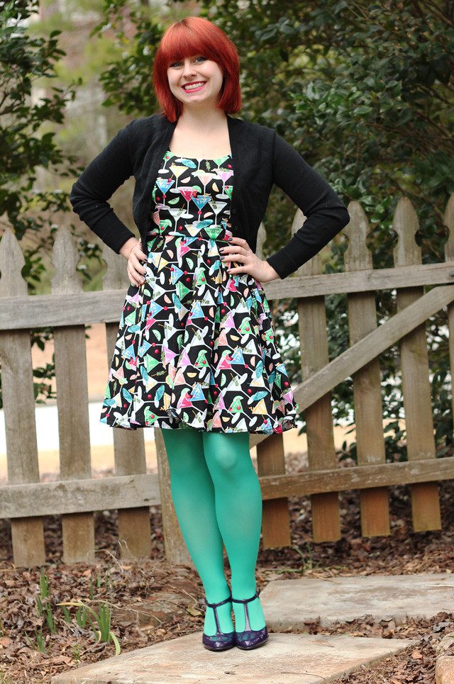 Aqua green pantyhose and multicolored dress worn by Jamie