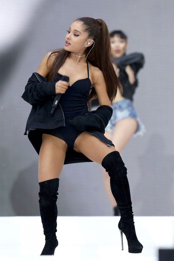 Ariana Grande in tan pantyhose, overknee boots and black catsuit