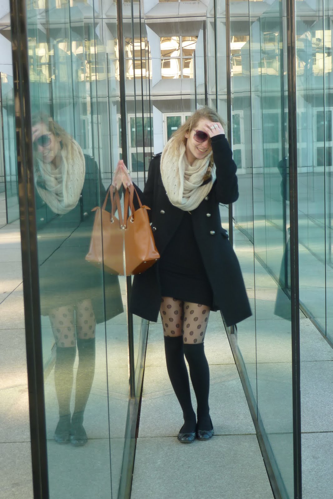 Black sheer dotted tights worn by Saskia van Rij