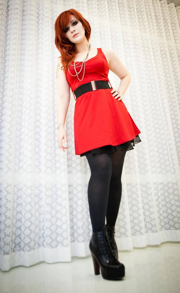 Black tights with bright red dress by Molly McIsaac