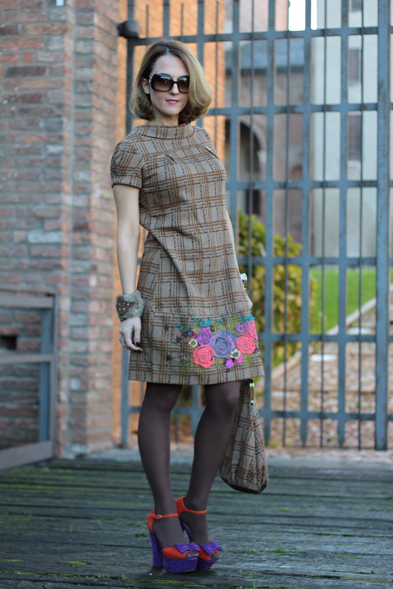 Brown opaque tights, vintage style dress with flower embroidery and multicolored shoes worn by Margaret
