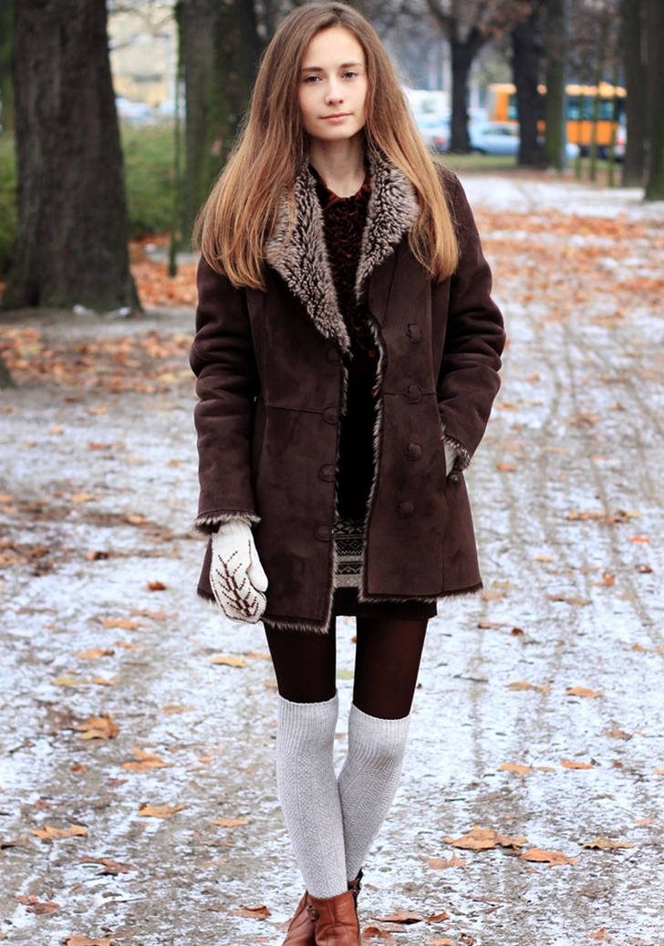 Grey wool socks over black tights with brown fur-lined jacket and boots worn by Wioletta