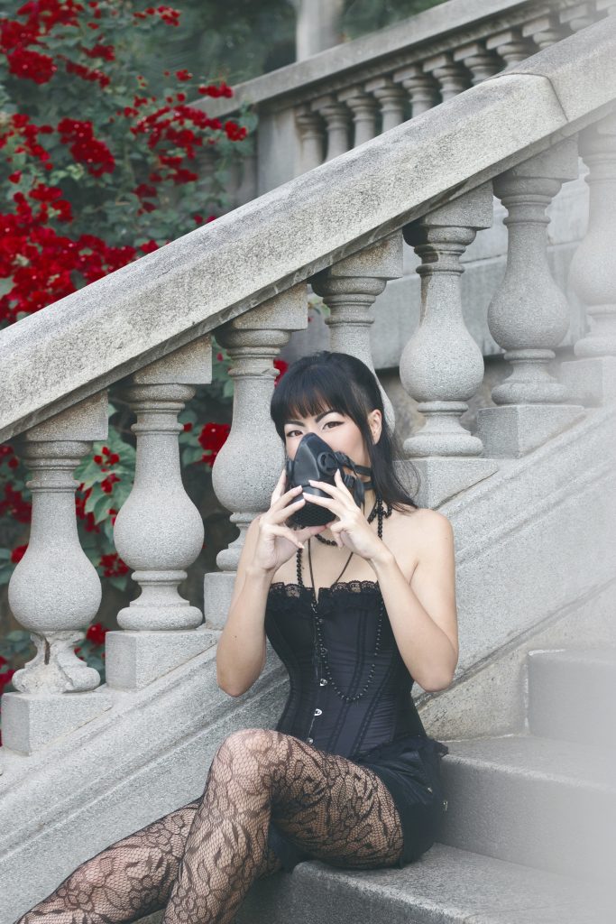 Black lace gothic pantyhose and dress worn by Isis Tomie