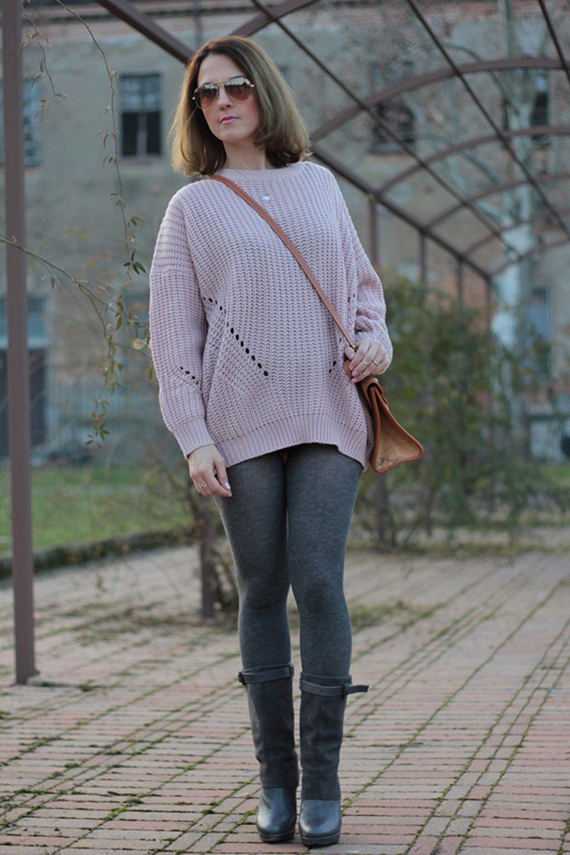 Grey wool leggings, long black boots and oversized pink sweater worn by Margaret
