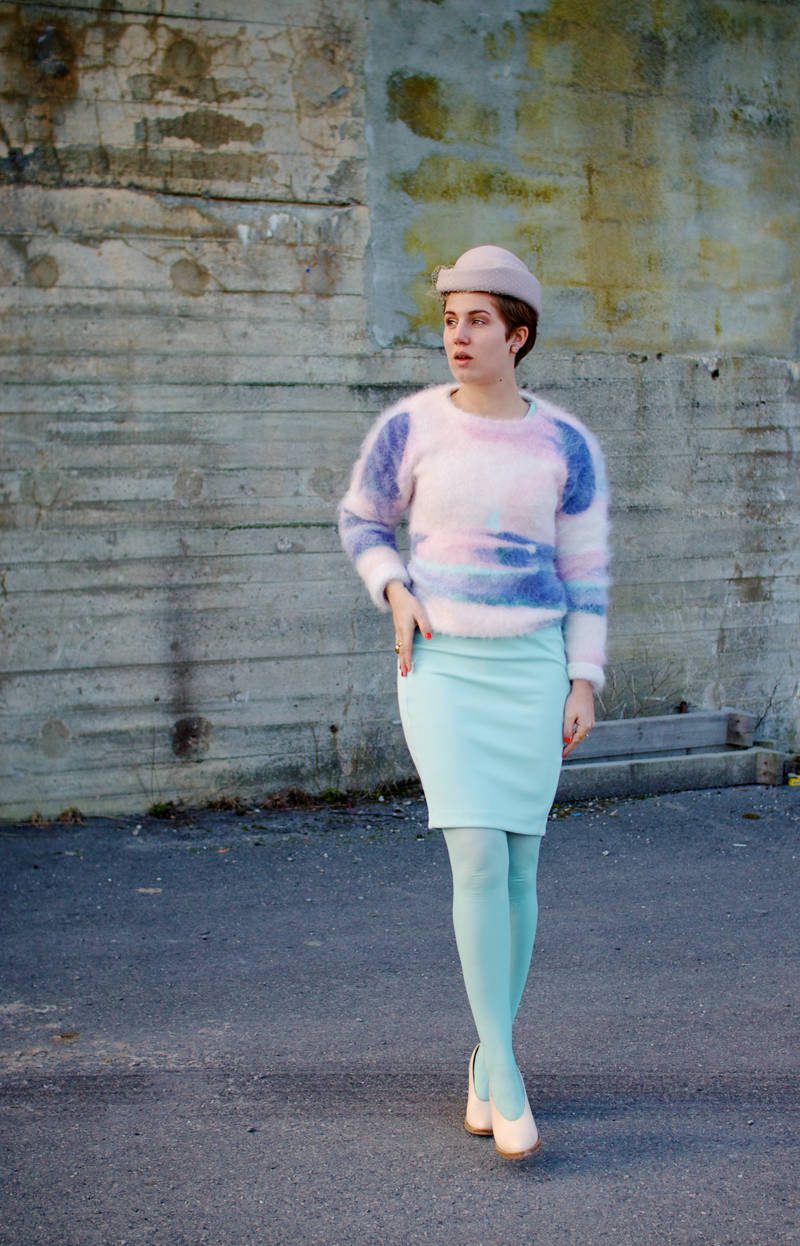 Teal opaque tights and pastel pink furry sweater and hat worn by Iben Bergstrøm
