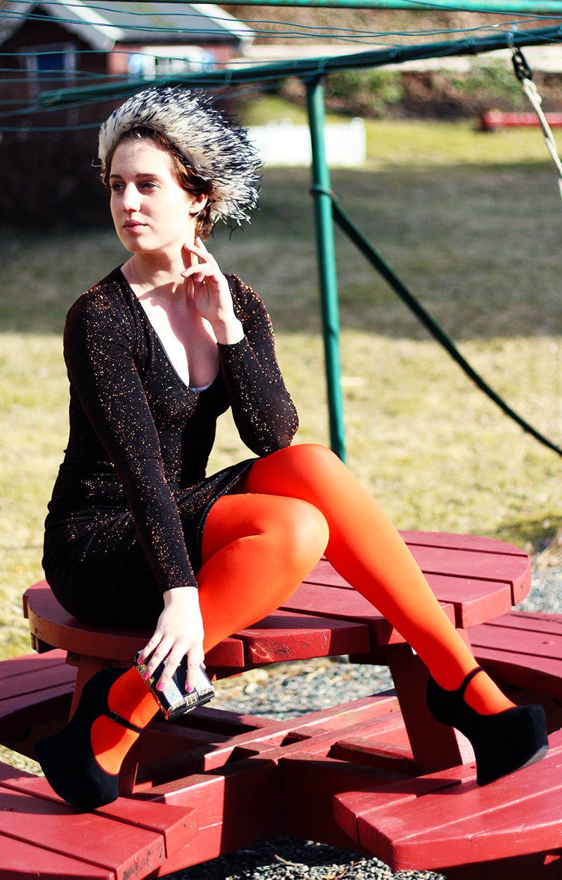 Bright orange tights and black dress worn by Iben Bergstrøm