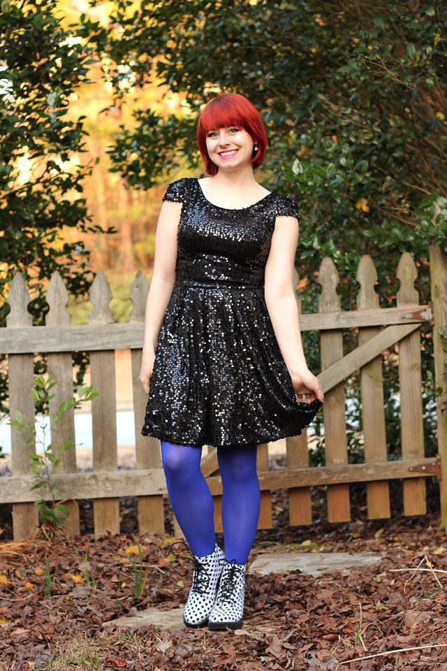 Purple tights and black sequin dress worn by Jamie