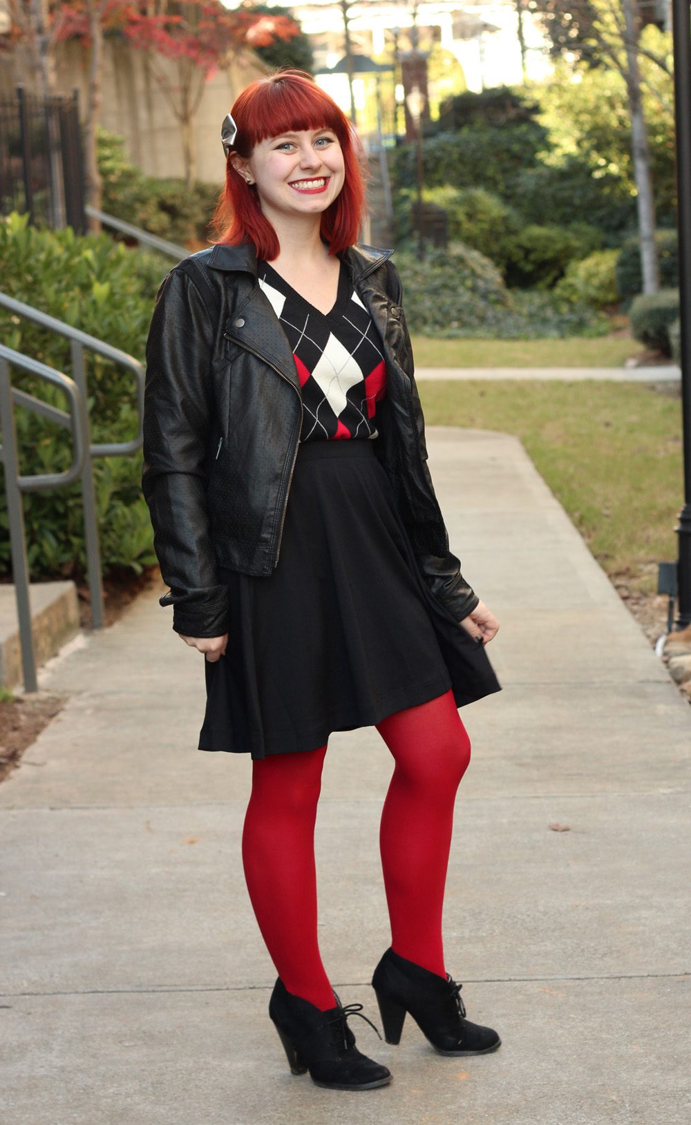 Red pantyhose, black skirt and leather jacket worn by Jamie