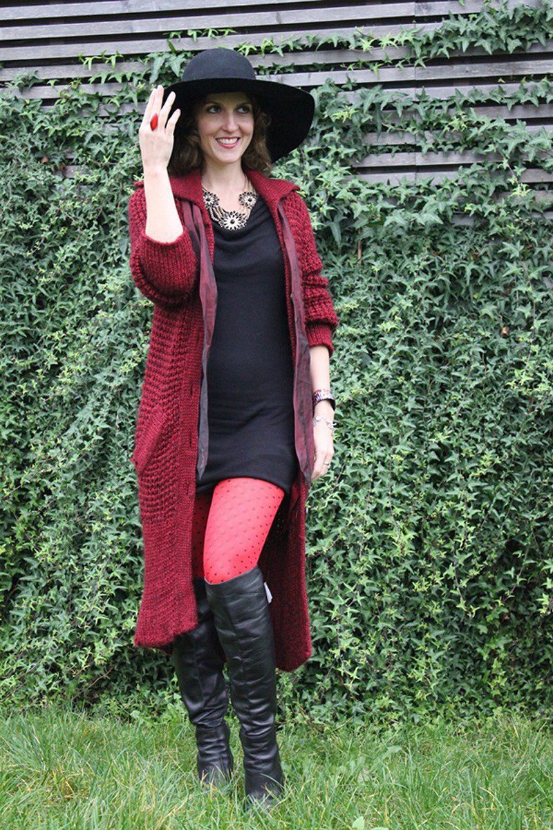Red polka dot pantyhose, black dress, black leather boots and long red wool coat worn by Margaret