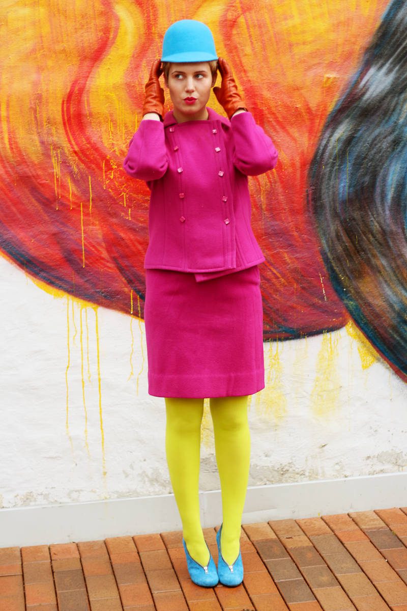 Lemon yellow tights, pink skirt suit and light blue shoes + hat worn by Iben Bergstrøm